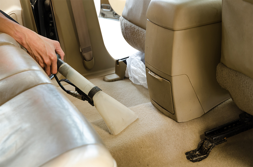 Professional  Cleaning Of Interior Back Seats Carpet SUV Model Cars By Wet Vacuum Machine.